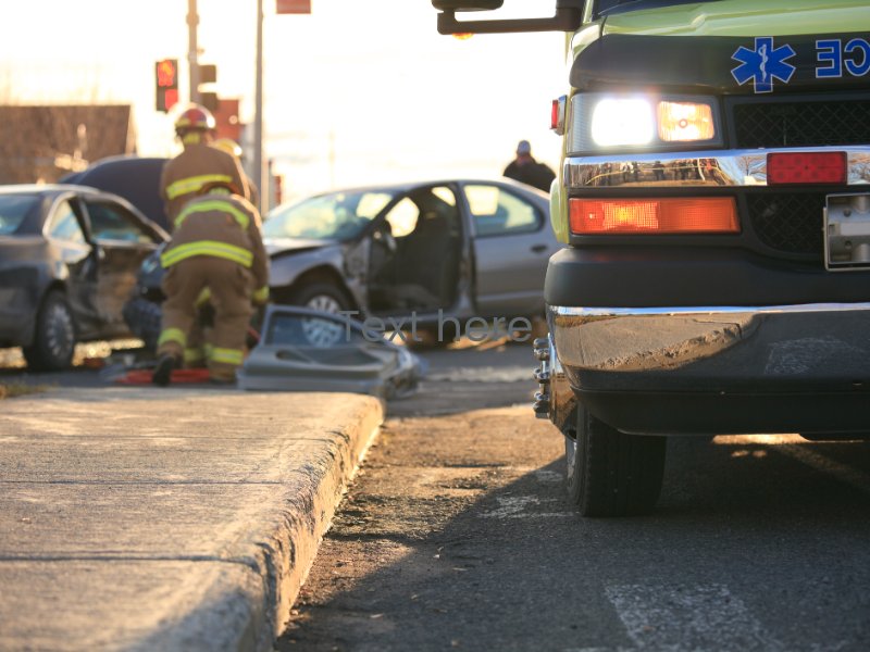 Ambulance attending two vehicle accident in Peachtree Corners, GA